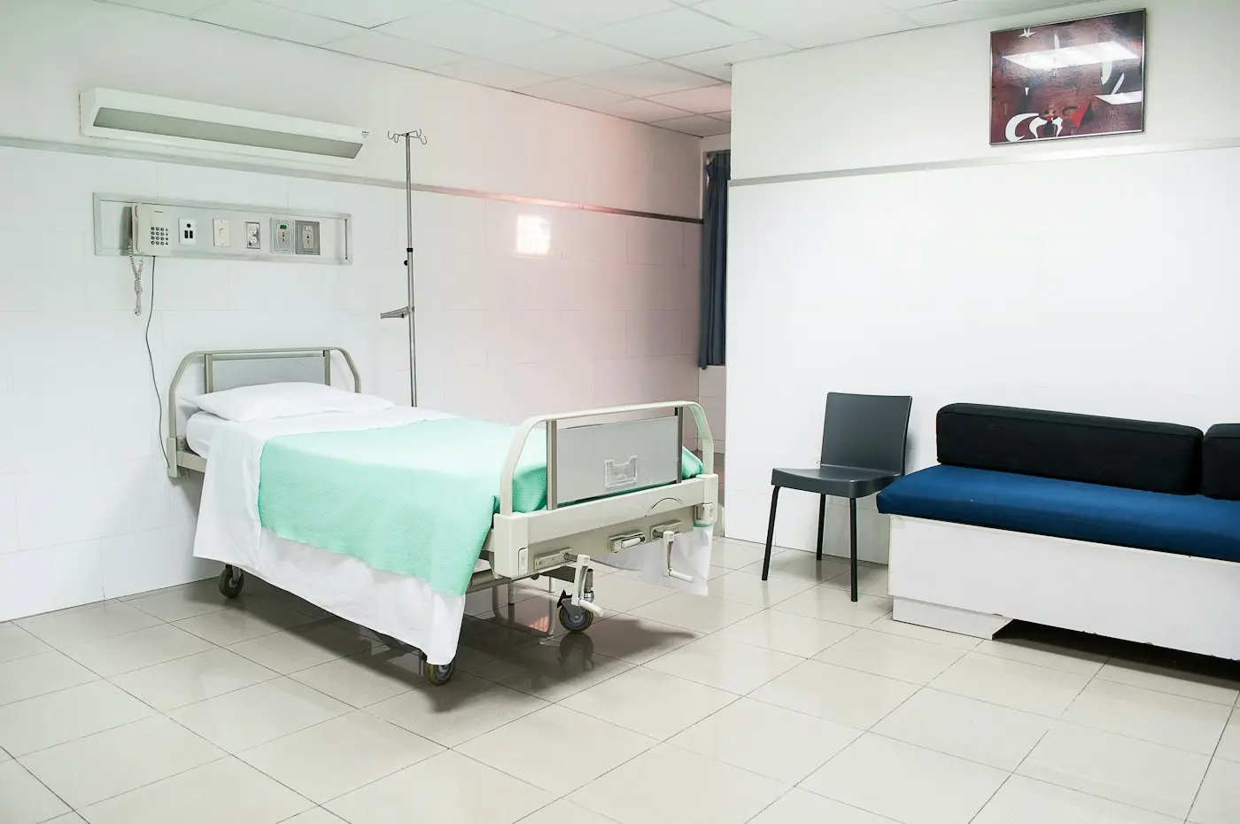 Stock photo of an empty hospital room. Not Vijaya Hospital Kottarakara.